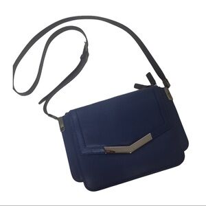 Time’s Arrow Leather Crossbody Bag